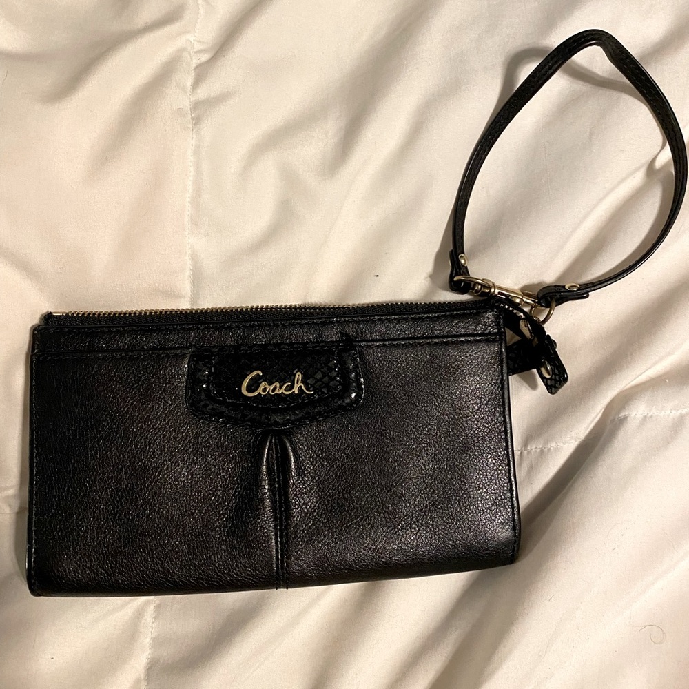 Coach large wristlet in black leather with gold lettering